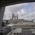 View of dish and roofs