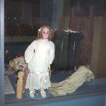 Dolls in display case